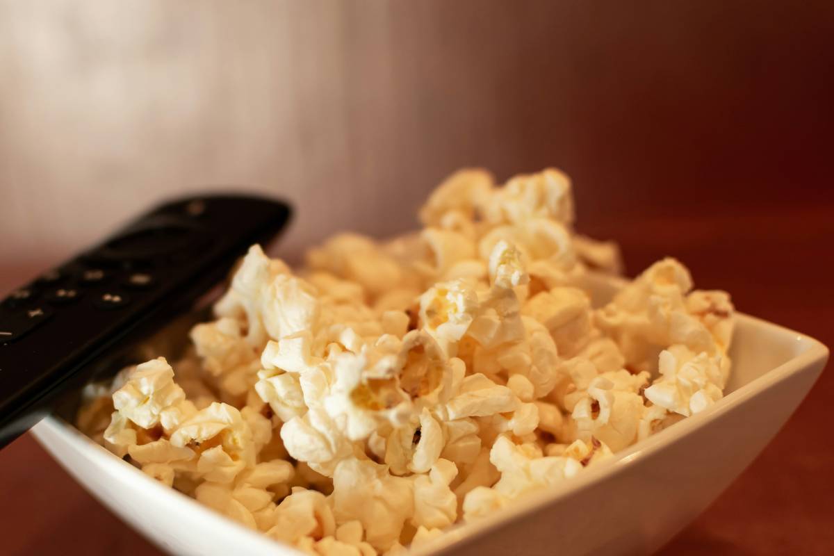 Side-by-side comparison of tasty energy snacks vs sugary alternatives on gaming setup
